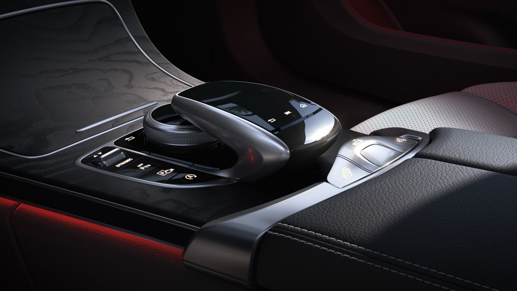 Na obrázku je touchpad vozidla Mercedes-Benz Třídy C kabriolet.